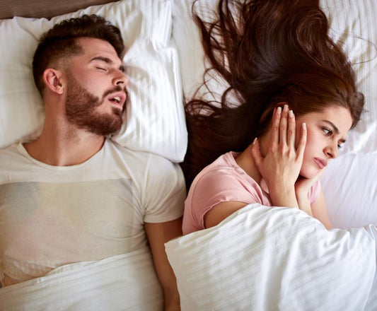 How to Sleep When Someone is Snoring - City Mattress Staging