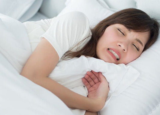 How to Stop Grinding Your Teeth in Your Sleep Naturally - City Mattress Staging