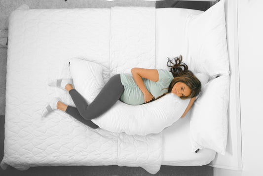 Pillow Talk: How Placing a Pillow Between Your Legs Can Enhance Your Sleep - City Mattress Staging