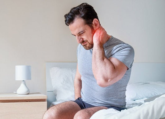 What Is the Best Way to Sleep With Neck Pain? - City Mattress Staging