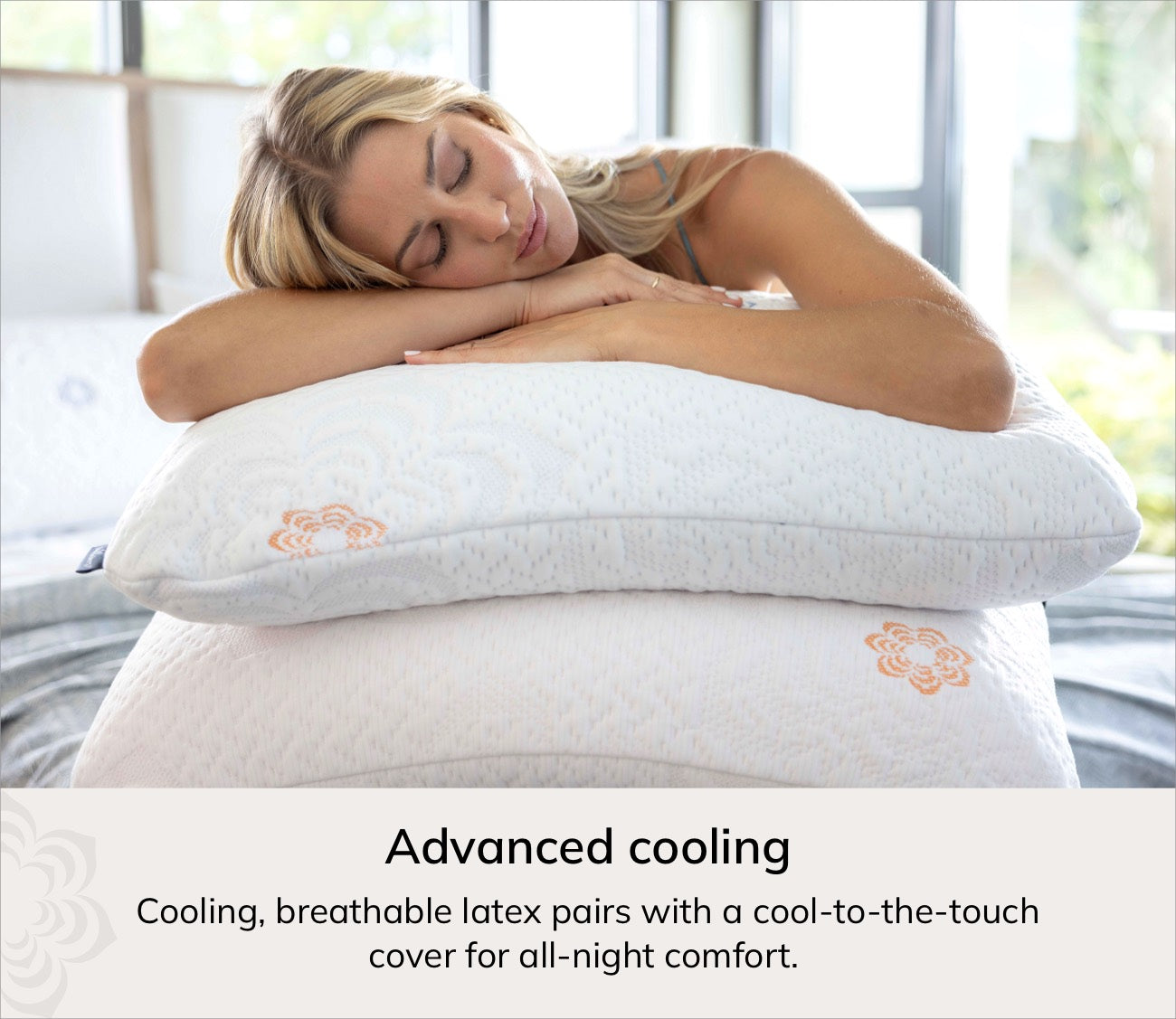 A woman rests her head on a stack of Karma cooling latex pillows in a bright bedroom setting. Text at the bottom reads 'Advanced cooling' and describes breathable cooling properties.