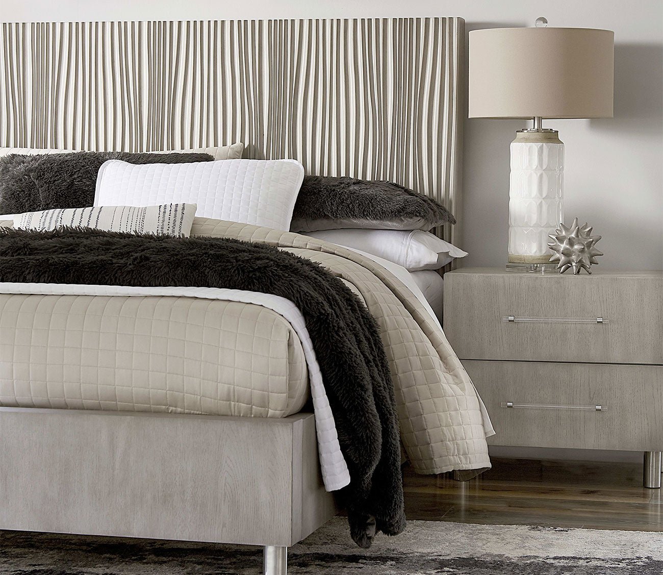 Close-up Argento bed in misty grey with nightstand