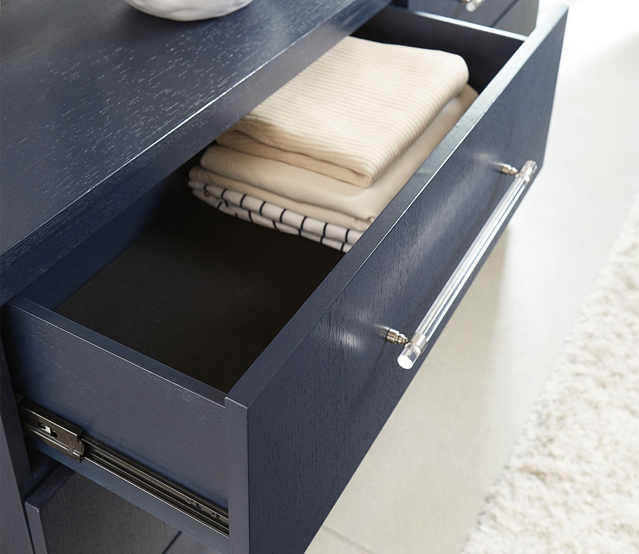 Close up of Argento dresser with open drawers