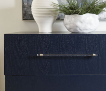 Close-up of Argento nightstand in navy featuring hardware