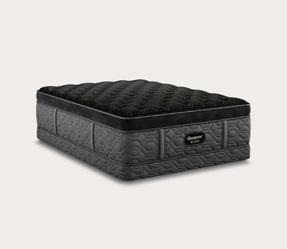 Beautyrest Black Series Four Plush Pillow Top Mattress by Simmons - silo image on a low-profile foundation.