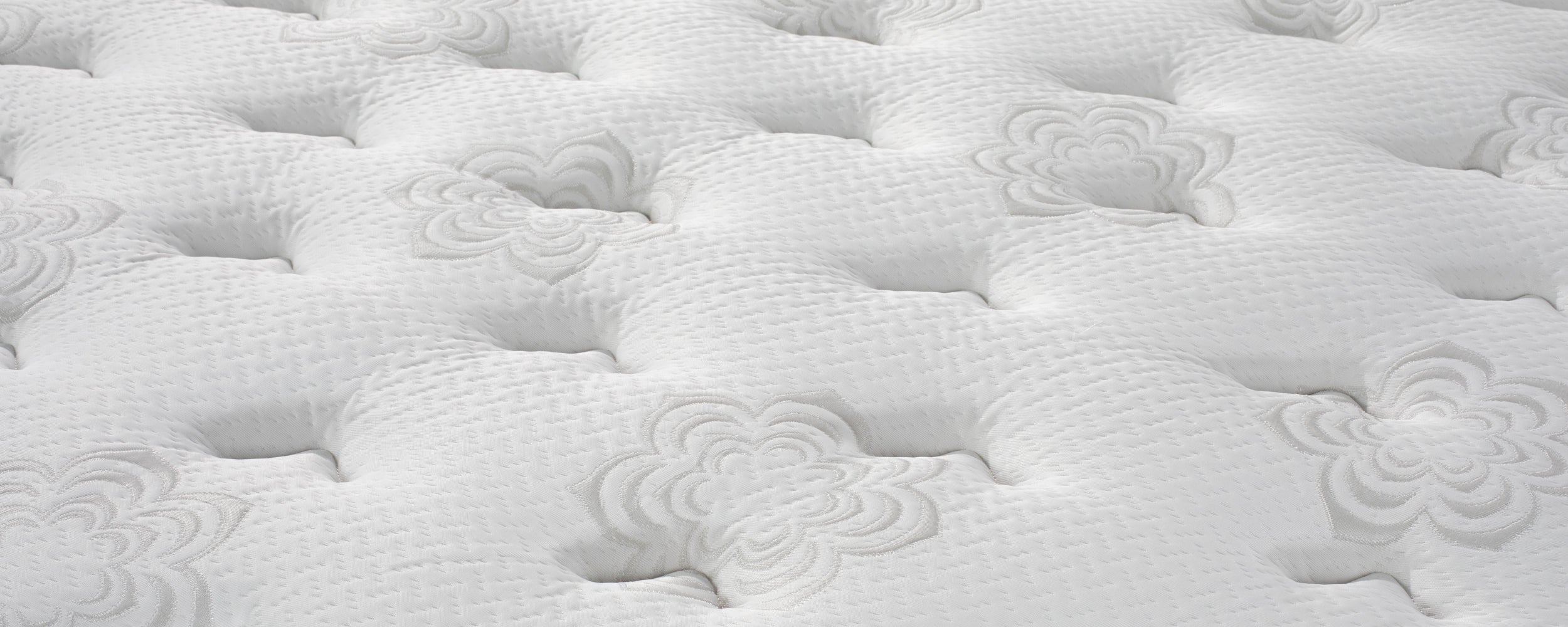 Close-up of Dharma Elite Super Cush Mattress.