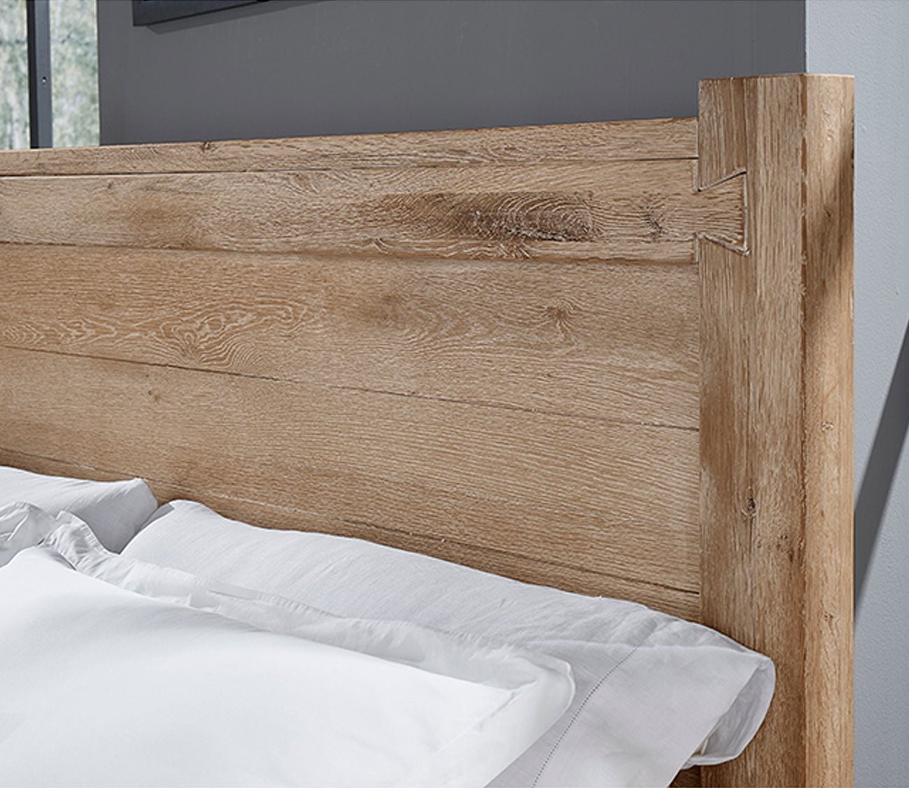 Close up of Dovetail 6X6 Bed headboard in sun-bleached white