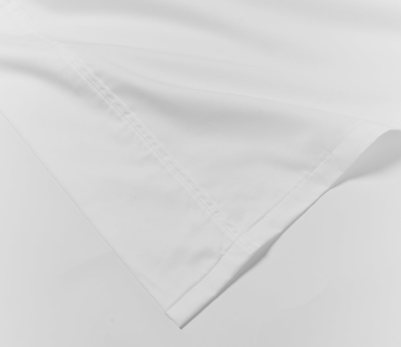 DreamFit 100% Egyptian Cotton Sheet Set by DreamFit in white, detail of stitching
