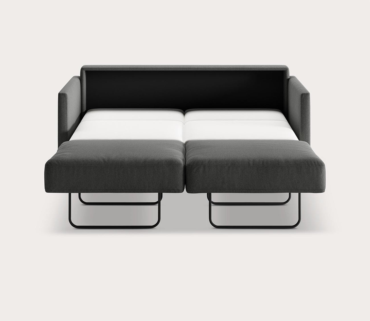 Elfin Sleeper Sofa in dark gray fully extended into a bed with a pull-out sleeping surface
