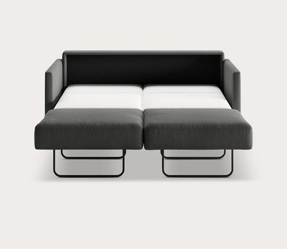 Elfin Sleeper Sofa in dark gray fully extended into a bed with a pull-out sleeping surface