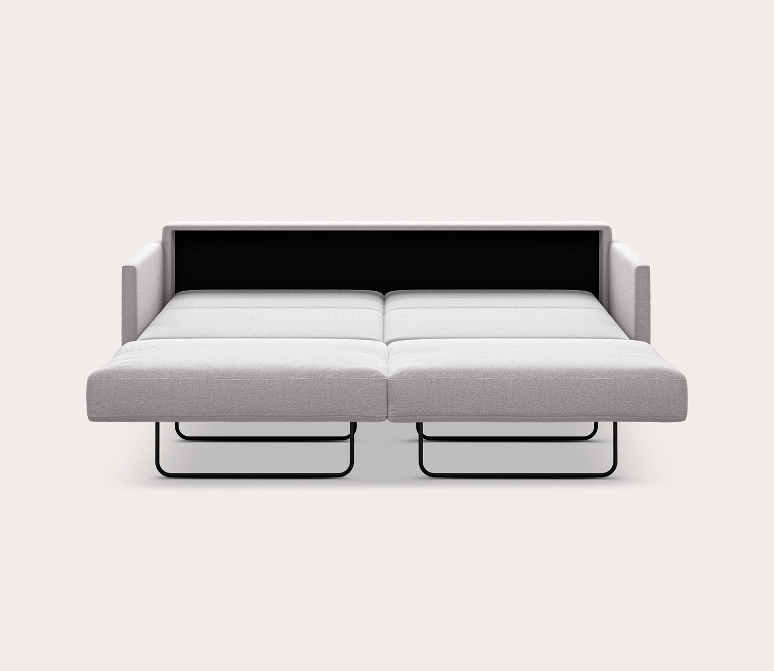 Elfin Sleeper Sofa in light gray fully extended into a bed with a pull-out sleeping surface