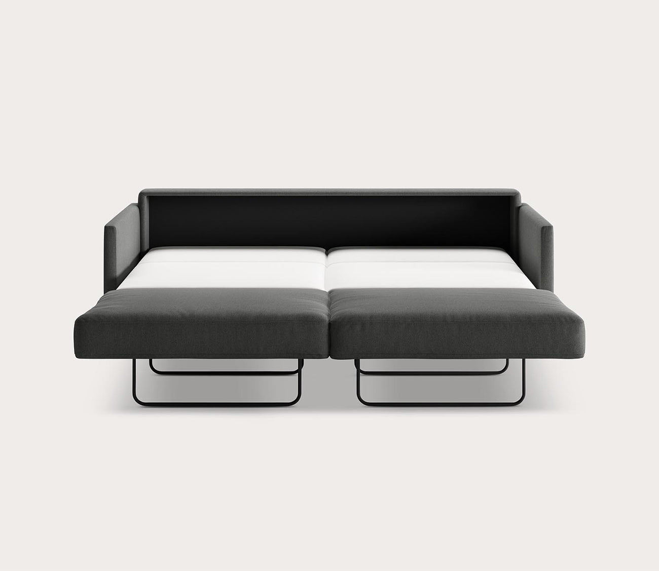 Elfin Sleeper Sofa in dark gray fully extended into a bed with a pull-out sleeping surface