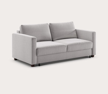 Fantasy 2 Sleeper Sofa by Luonto in silo, side angle