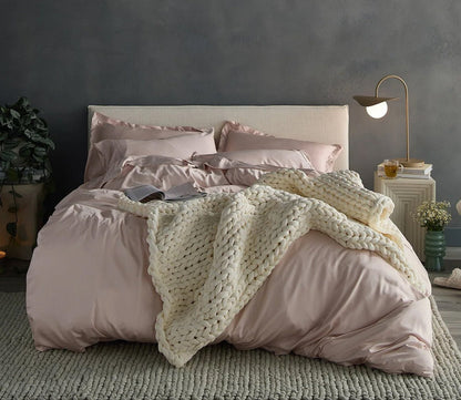 Hush Knit Weighted Blanket by Hush Blankets, in cream on bed