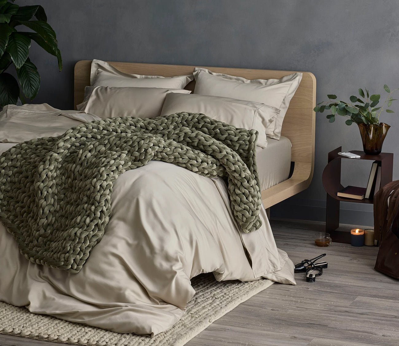 Hush Knit Weighted Blanket by Hush Blankets in olive on bed