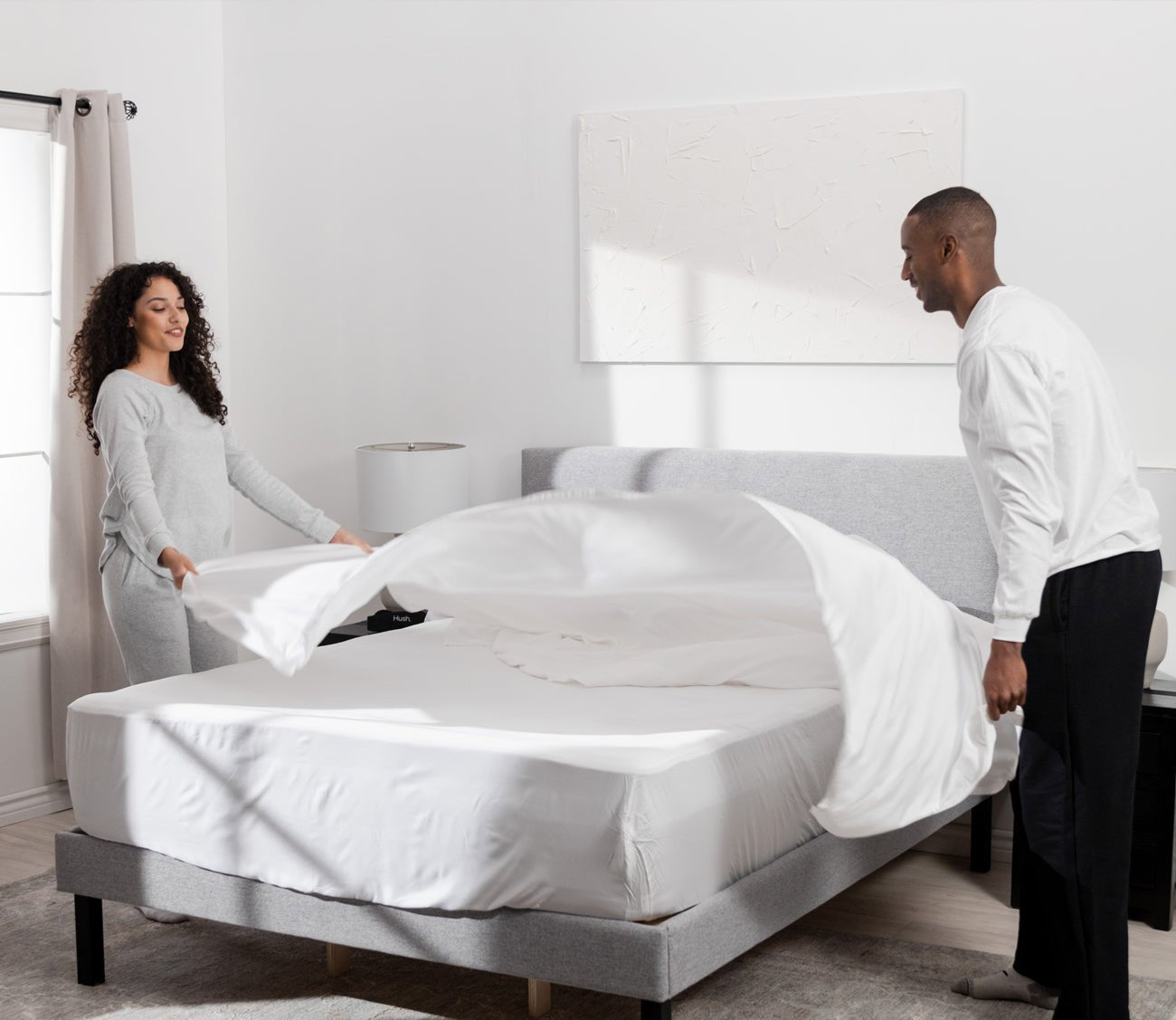 Iced Cooling Sheet Set by Hush Blankets, couple making bed