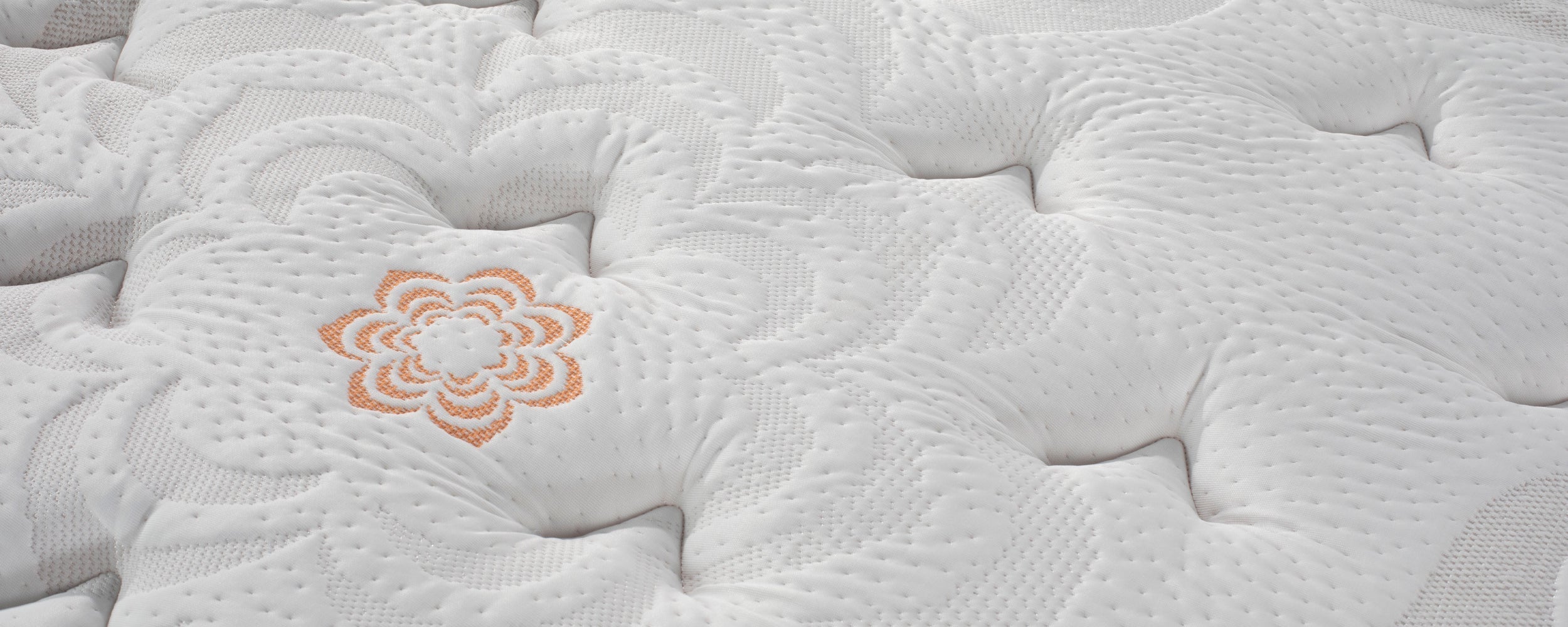 Close-up of Karma Elite Hybrid Super Cush Mattress by PranaSleep.