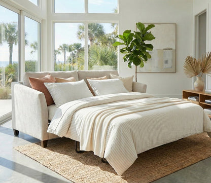 Luonto Naples Sleeper Sofa in light gray in room scene, open with bedding