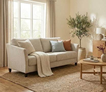 Luonto Naples Sleeper Sofa in light gray in room scene, angled