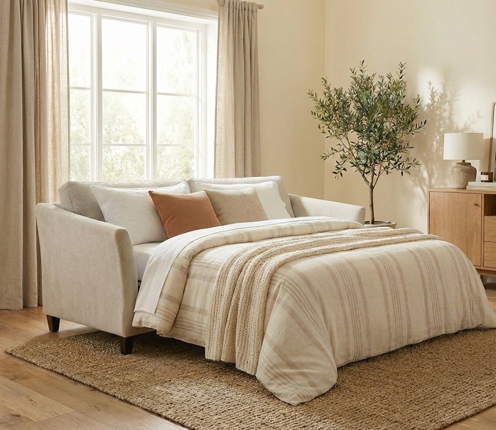 Luonto Naples Sleeper Sofa in light gray in room scene, open with bedding