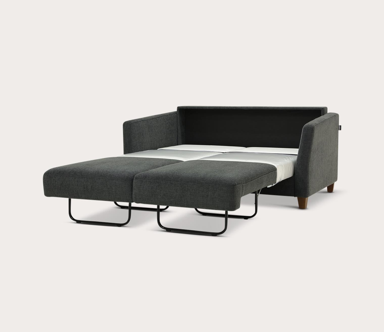 Monika Sofa Sleeper by Luonto in Charcoal, silo, open