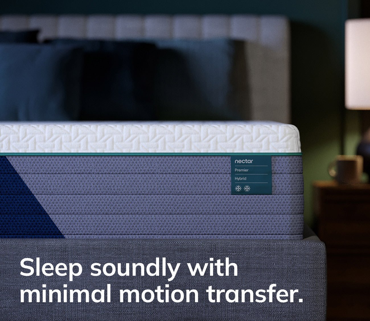 Hand resting on Nectar 5.1 Premier Hybrid Mattress showcasing cool-touch quilted mattress cover.