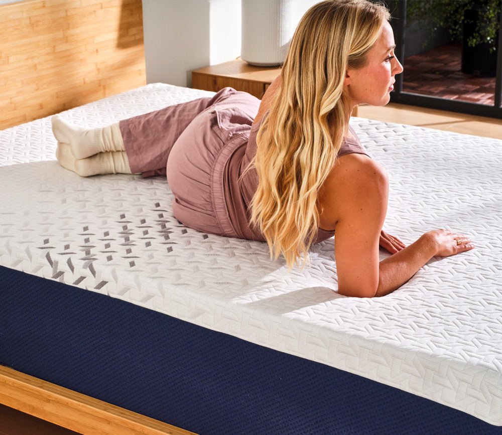 Woman relaxing on Nectar 5.1 Premier Memory Foam Mattress by Nectar