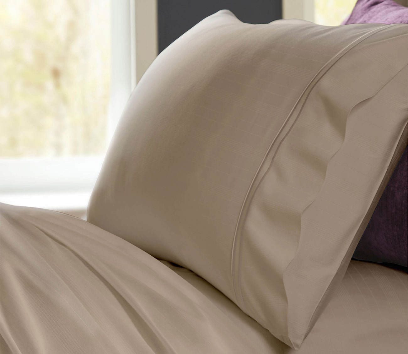 Purecare Premium Bamboo Sheet Set in sand, closeup of pillowcase