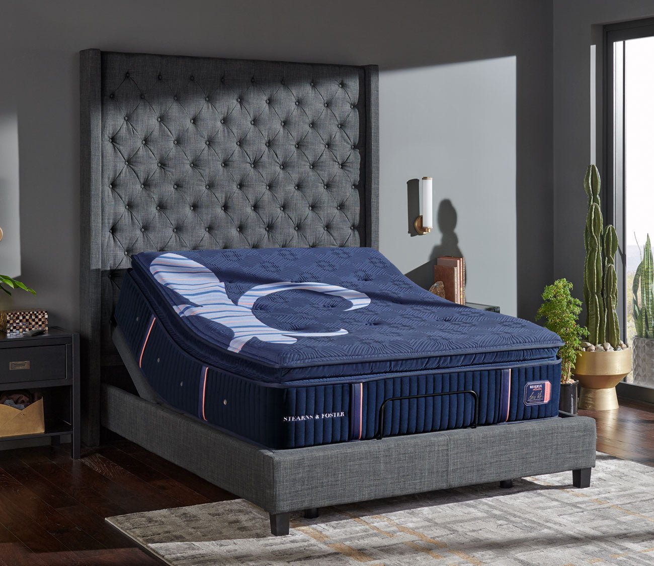 Reserve Plush Euro Pillow Top Mattress on an adjustable base in a lifestyle setting.
