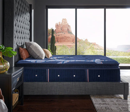 Reserve Plush Euro Pillow Top Mattress in a lifestyle setting - side view.