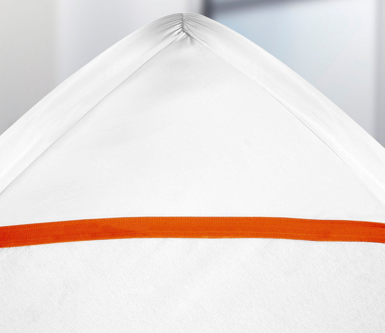 Reversa-Temp 5-Sided Mattress Protector by PureCare - red side has warming, insulating properties