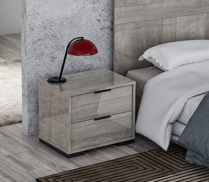 Close up of Rimini nightstand next to a Rimini bed