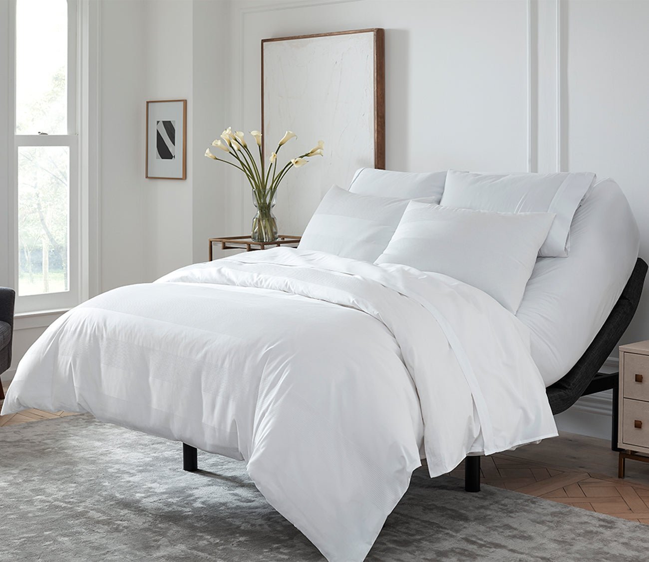 S5000 Adjustable Bed Base by Sleeptone in roomscene with dressed bed