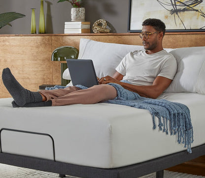 Serta Baselogic Platinum Adjustable Base  with an elevated head position, supporting comfortable lounging and reading in bed