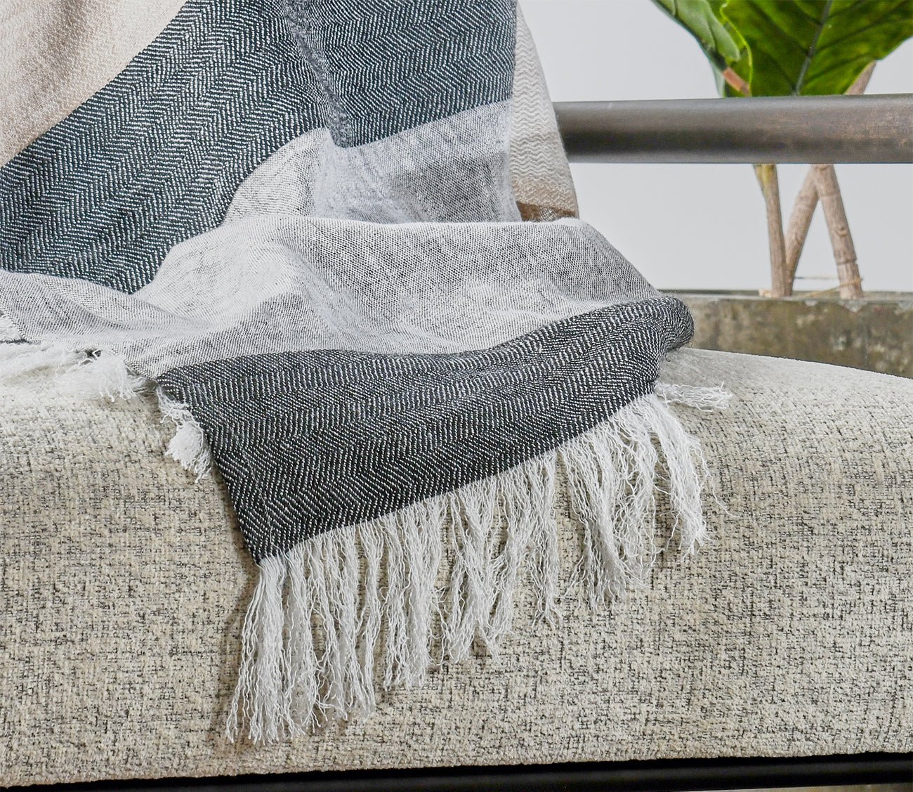 Talara Crafted Throw Blanket by Villa by Classic Home, in natural, closeup on fringe
