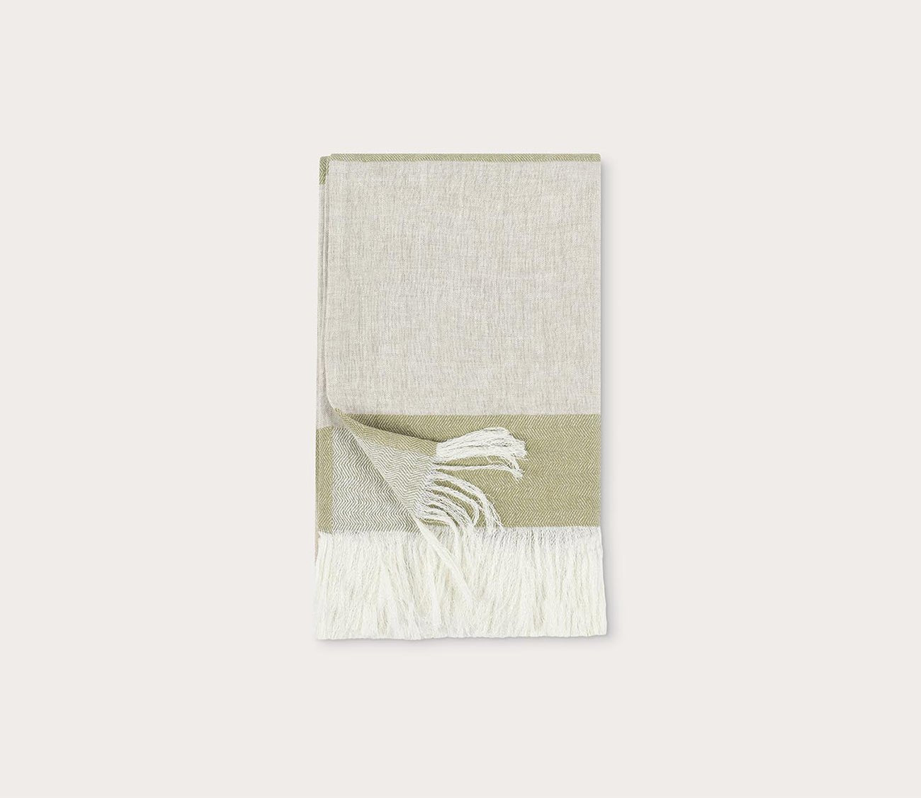 Talara Crafted Throw Blanket by Villa by Classic Home, in green, silo with fringe detail