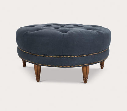 Bedell Tufted Blue Linen Round Ottoman by Safavieh