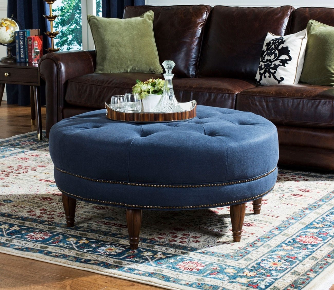 Bedell Tufted Blue Linen Round Ottoman