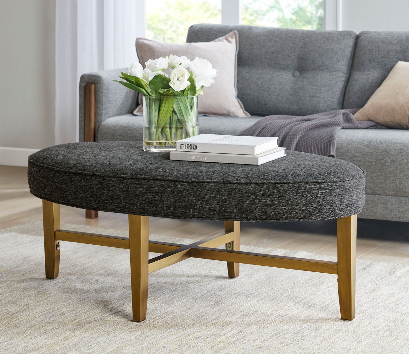Kipling Upholstered Oval Cocktail Ottoman