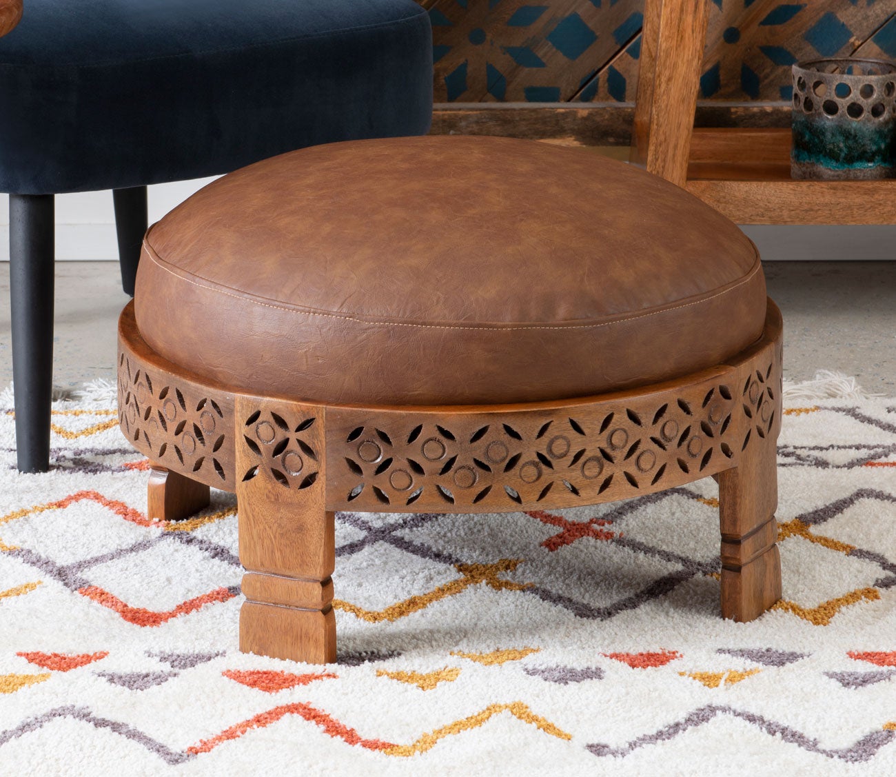 Taini Round Upholstered Wood Ottoman