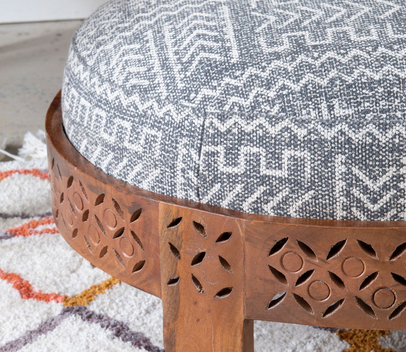 Taini Round Upholstered Wood Ottoman by Powell